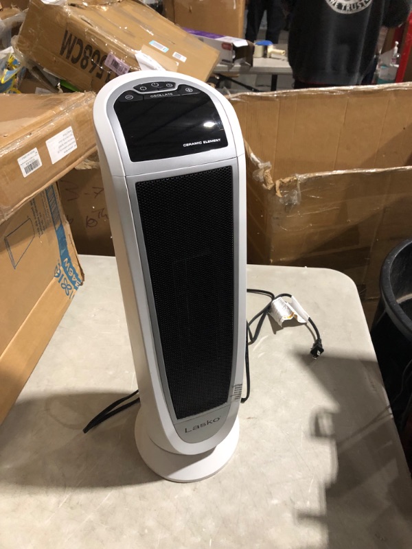 Photo 2 of ***NONREFUNDABLE - NOT FUNCTIONAL - FOR PARTS ONLY - SEE COMMENTS***
Lasko Oscillating Digital Ceramic Tower Heater for Home with Overheat Protection, Timer and Remote Control, 22.75 Inches, 1500W, White, 5165