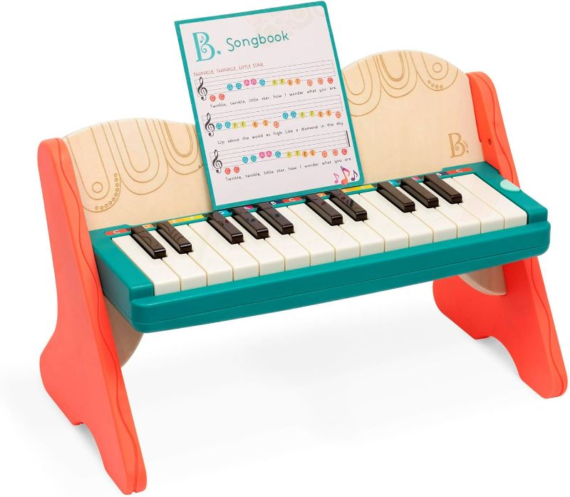 Photo 1 of B. toys wooden toy piano with songbook, piano wooden toy, music toy, musical instrument to learn to play the piano for children from 3 years old.