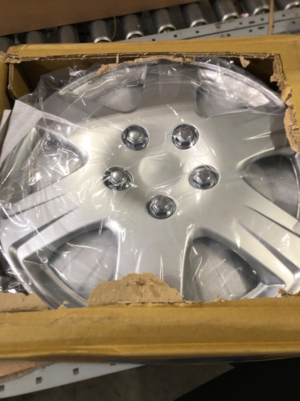 Photo 2 of Four ABS Plastic Silver Colored Hubcaps - 15 Inch Diameter