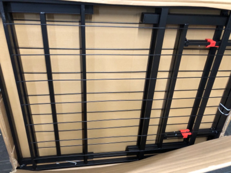 Photo 2 of ***USED - LIKELY MISSING PARTS - UNABLE TO VERIFY FUNCTIONALITY***
Amazon Basics Foldable Metal Platform Bed Frame with Tool Free Setup, 14 Inches High, Queen, Black Queen 14-Inch