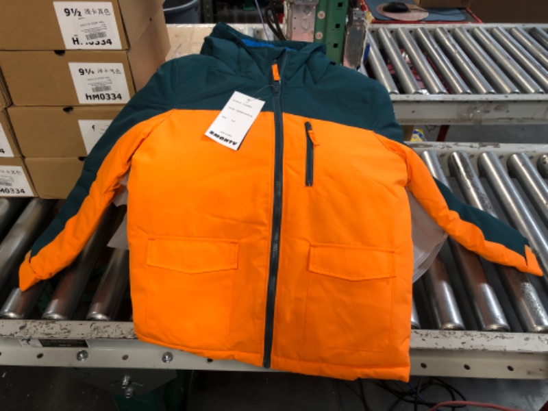 Photo 1 of Boy ski jacket size 8-9 Y orange 