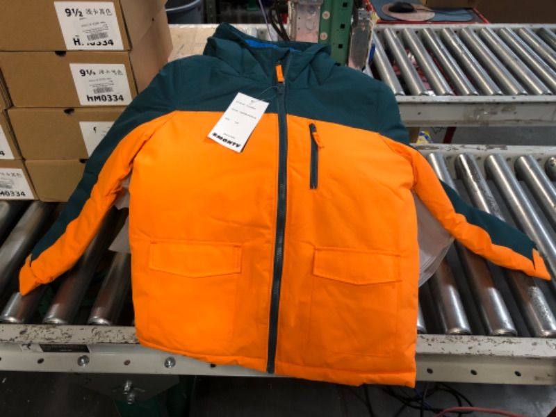 Photo 1 of Boy ski jacket size 8-9 Y orange 
