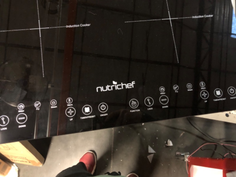 Photo 5 of **POWERS ON
NutriChef Double Induction Cooktop - Portable 120V Digital Ceramic Dual Burner 