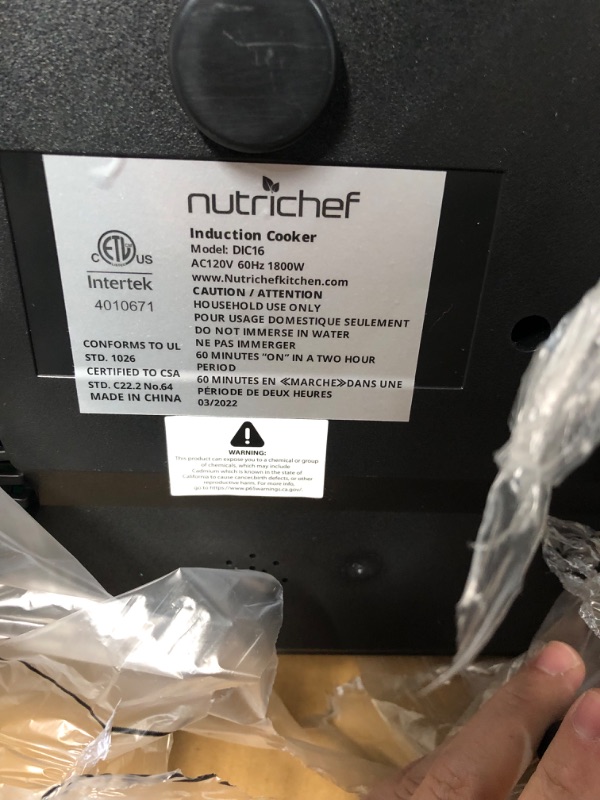 Photo 6 of **POWERS ON
NutriChef Double Induction Cooktop - Portable 120V Digital Ceramic Dual Burner 