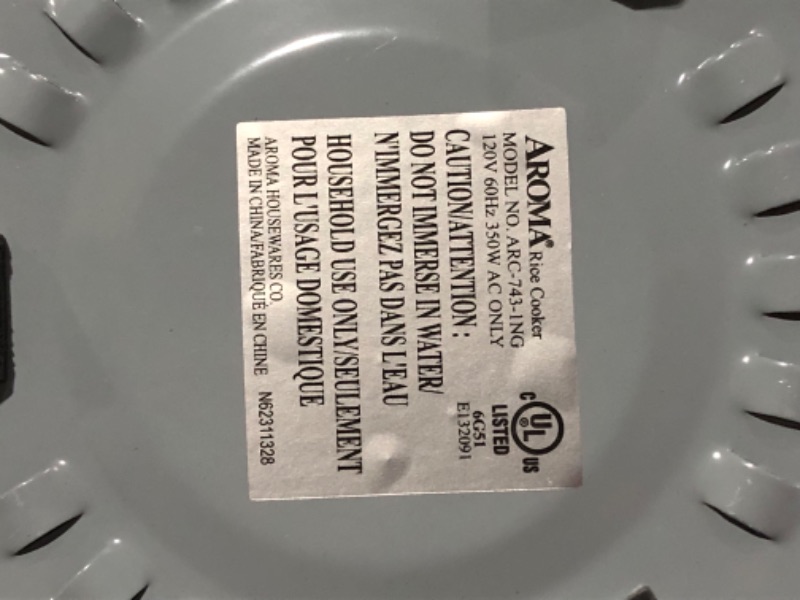 Photo 5 of ***USED - POWERS ON - UNABLE TO TEST FURTHER***
Aroma Housewares 6-Cup (Cooked) (3-Cup Uncooked) Pot Style Rice Cooker and Food Steamer (ARC-743-1NG), White White Steamer, 10.4"D x 11.1"W x 8.1"H