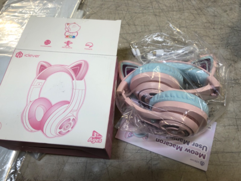 Photo 2 of iClever Cat Ear Kids Bluetooth Headphones,LED Light Up On Ear Kids Wireless Headphones with Mic,74/85/94dB Volume Limited,50H Playtime,Bluetooth 5.2,Pink Headphones for iPad/Tablet/PC/Travel,BTH13