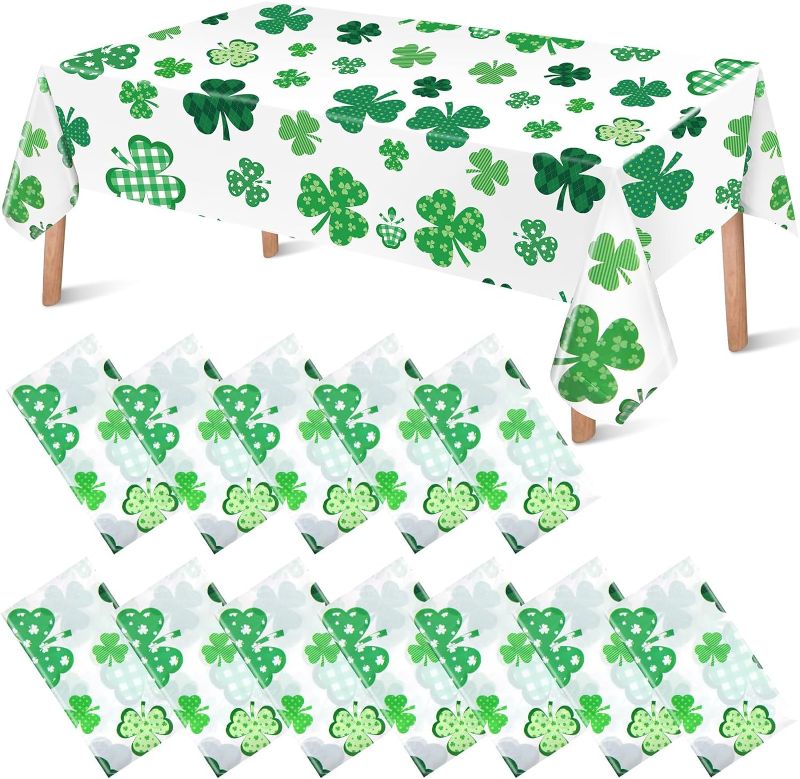 Photo 1 of 12 Pcs St. Patrick's Day Tablecloth 54 x 108 Inch Shamrocks Clover Irish Plastic Tablecover Saint Patricks Disposable Rectangle Table Cloths for Dining Room Party Picnic Decorations Supplies
