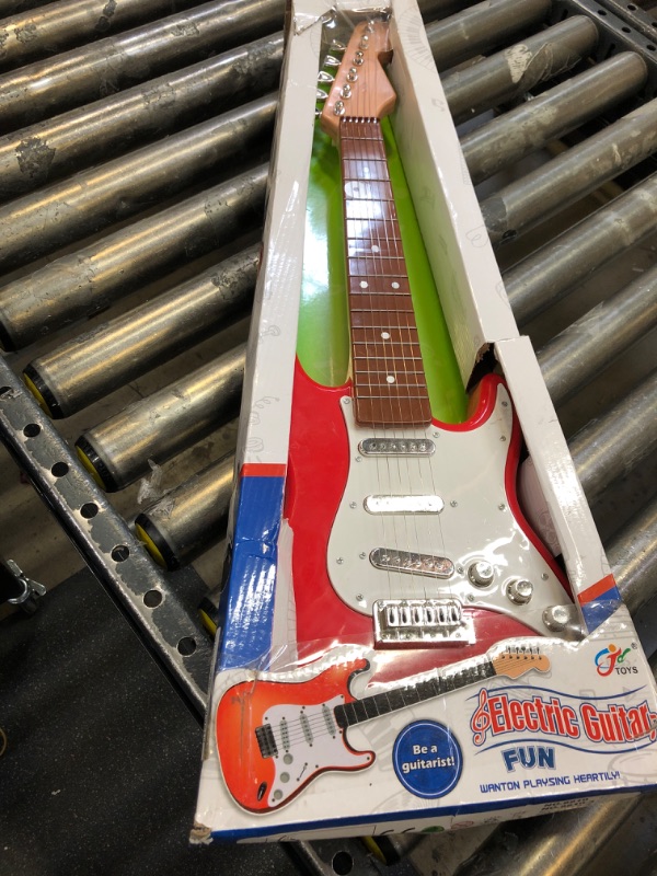 Photo 1 of childrens electric guitar toy