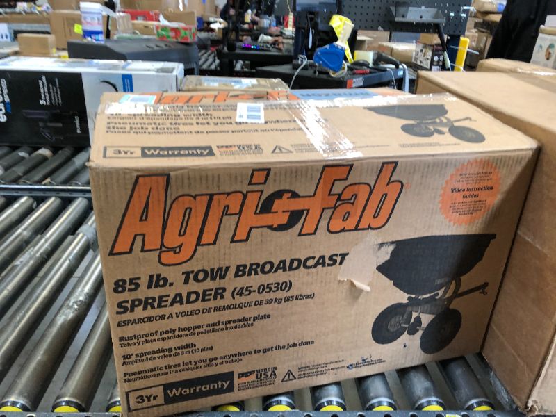 Photo 3 of Agri-Fab Inc 45-0530-131, 85 lb. Tow Broadcast Spreader, Black/Orange