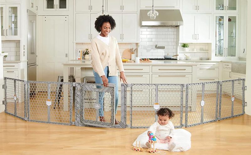 Photo 1 of Regalo Plastic 192-Inch Super Wide Adjustable Baby Gate and Play Yard with Door, Award Winning Brand, 2-in-1, Bonus Kit, Includes 4 Pack of Wall Mounts, Gray
