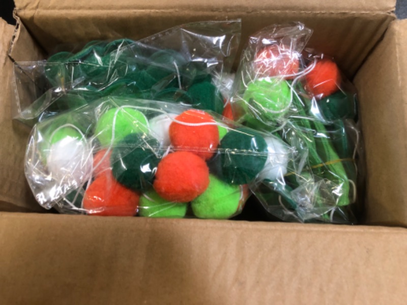 Photo 2 of 3 Pack St. Patrick's Day Felt Ball Garlands, 6.6 FT Lucky Pom Pom Shamrock Garlands, Green Orange White Felt Balls Irish Themed Party Favors for St. Patrick's Day Mantle Home Supplies Decorations
