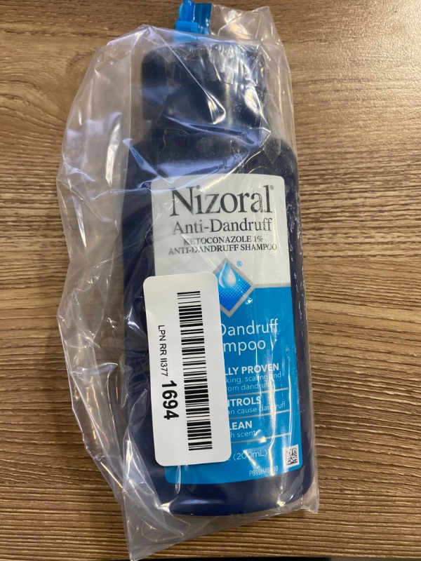 Photo 2 of Nizoral Anti-Dandruff Shampoo with 1% Ketoconazole, Fresh Scent, 7 Fl Oz
