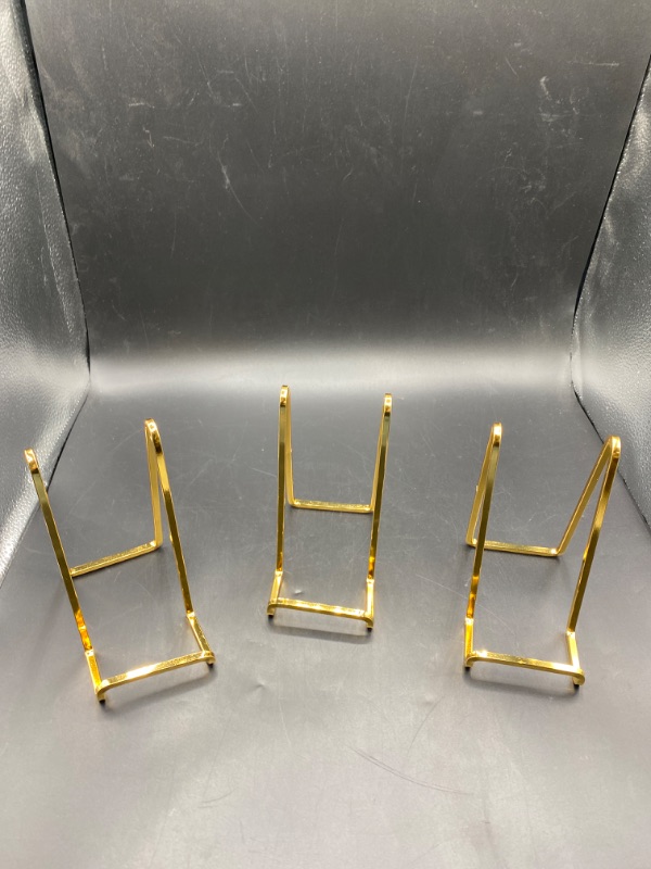 Photo 1 of Plate Holder Easel Display Stand - 6 inch Metal Plate Stands for Display - Tabletop Picture Stand - Gold Iron Easels for Display Pictures | Photo Frames | Book | Decorative Plates | Plaque - 3 Pack

