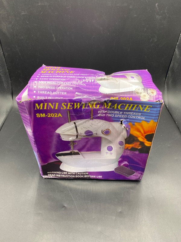 Photo 1 of Kucehiup Mini Sewing Machine, Portable Sewing Machine
