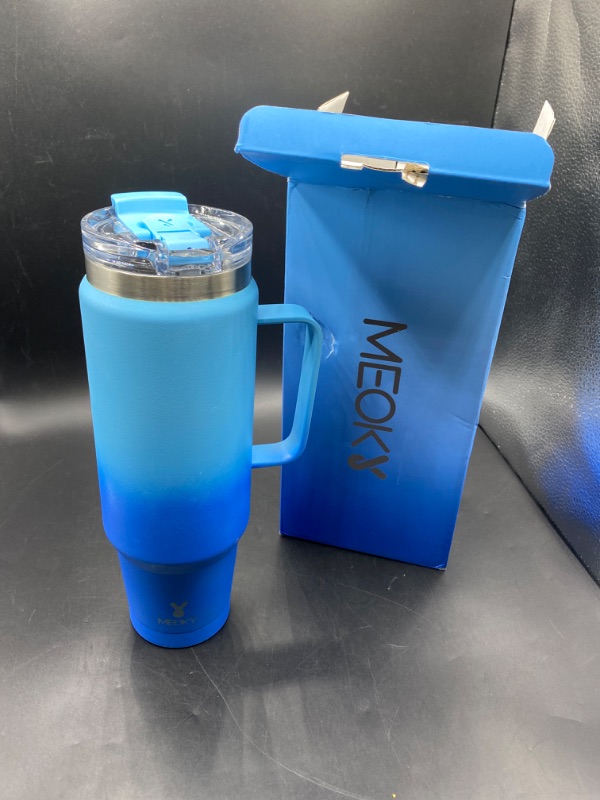 Photo 2 of Meoky 40 oz Tumbler with Handle and Straw, Insulated Tumbler with Lid and Straw, Stainless Steel Travel Mug, Keeps Cold for 34 Hours, 100% Leak Proof, Fits in Car Cup Holder (Sky)
