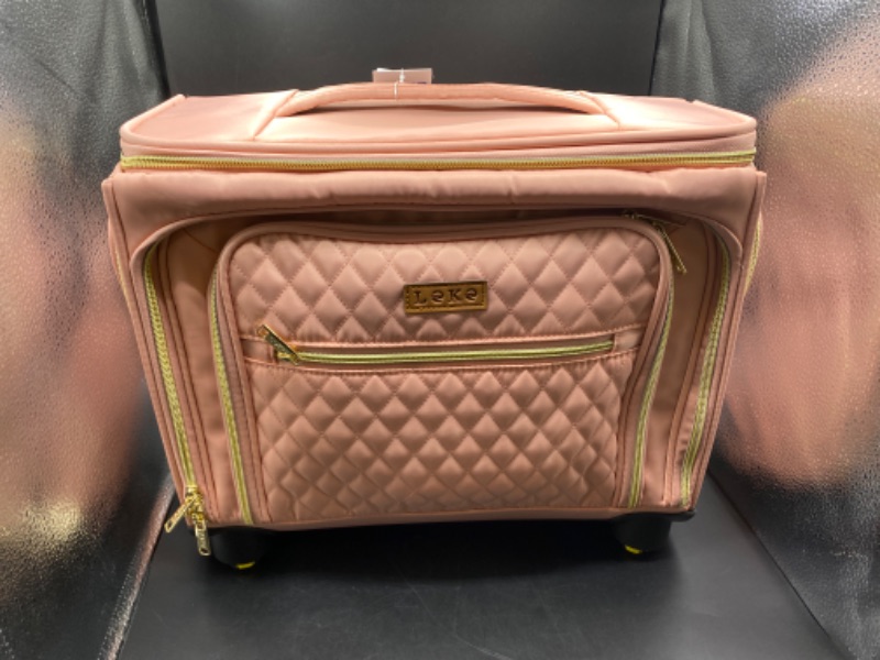 Photo 3 of Softside Expandable Luggage with 4 Spinner Wheels 20" Pink
