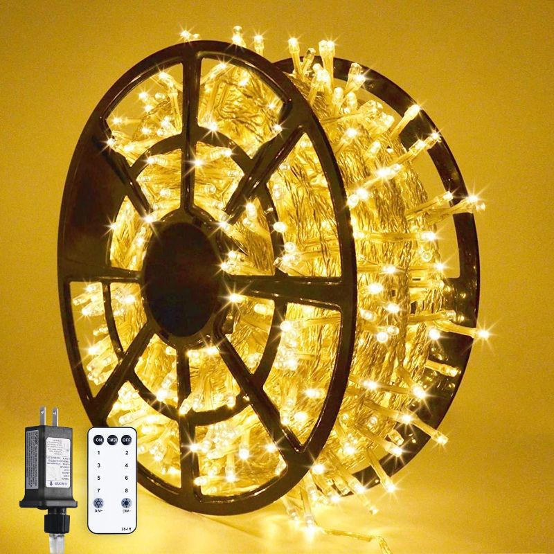 Photo 1 of JMEXSUSS 1000 LED Christmas Lights Outdoor Indoor String Lights with 8 Modes Warm White Christmas Tree Lights with Remote Controller Plug in for Tree Room Yards Patio Christmas Decorations
