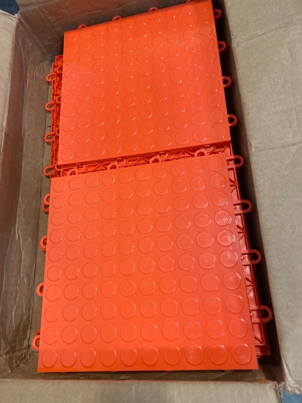 Photo 2 of FlooringInc's Nitro 12"x12" Snap-Together Garage Flooring Tiles, (12 Tiles) Non-Slip Interlocking Plastic Garage Floor Mat, Garage Organization & Garage Storage, Coin Pattern, Harley Orange, 
