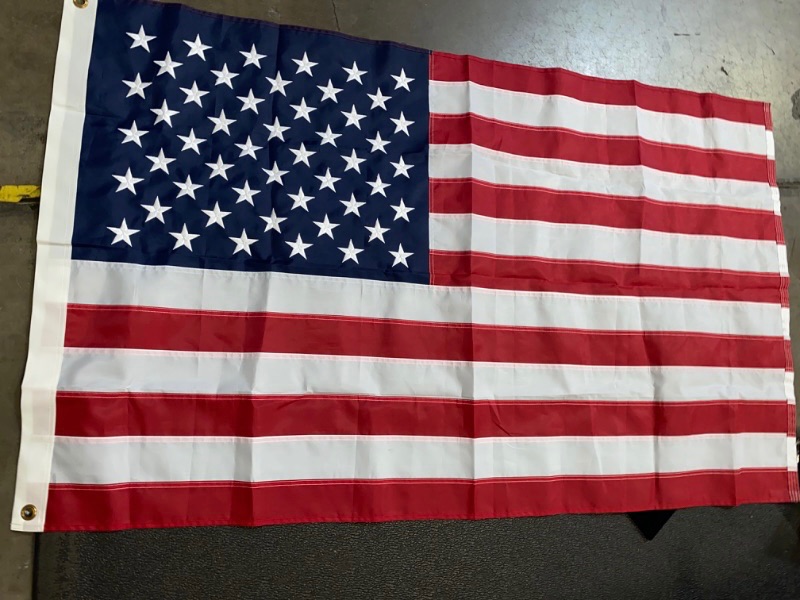 Photo 2 of American Flag 3x5 ft: Longest Lasting US Flag, Made From Nylon, Embroidered Stars, Sewn Stripes, Brass Grommets, UV Protection Perfect for Outdoors! USA Flag
