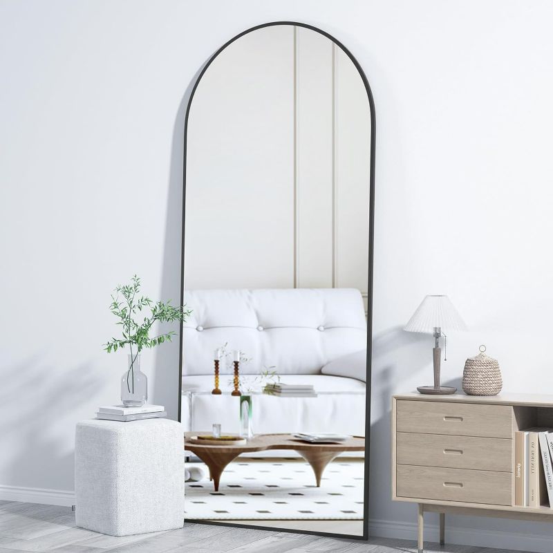 Photo 1 of CASSILANDO Arched Full Length Mirror 64" x 21", Floor Standing Mirror, Unique Vertical Mirror, Black Metal Frame Mirror, for Living Room, Bedroom, Entrance, and Bathroom