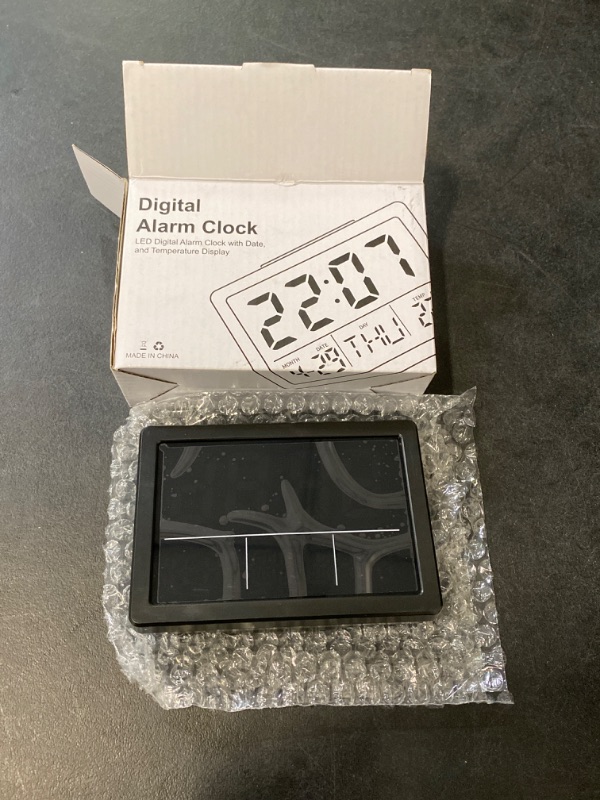 Photo 1 of Amgico Digital Alarm Clock with Snooze, Small Clock/Table Clock, 6.3" LED Digital Calendar, 12/24H, Adjustable Brightness/Volume, Desk Clock for Bedroom, Living Room, Office - Black
