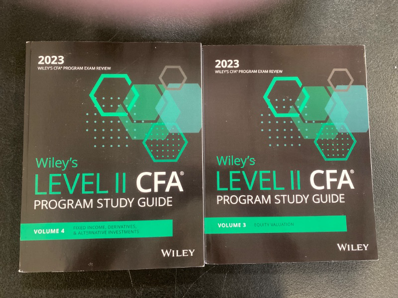 Photo 1 of Only included Volume 3 and 4 of Wiley's CFA Program Exam Review