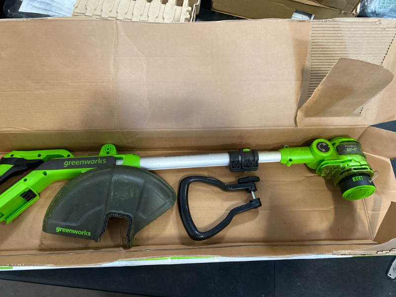 Photo 2 of ** FINAL SALE – SOLD AS IS ** Greenworks 40V 12" Cordless String Trimmer, 2.0Ah Battery 