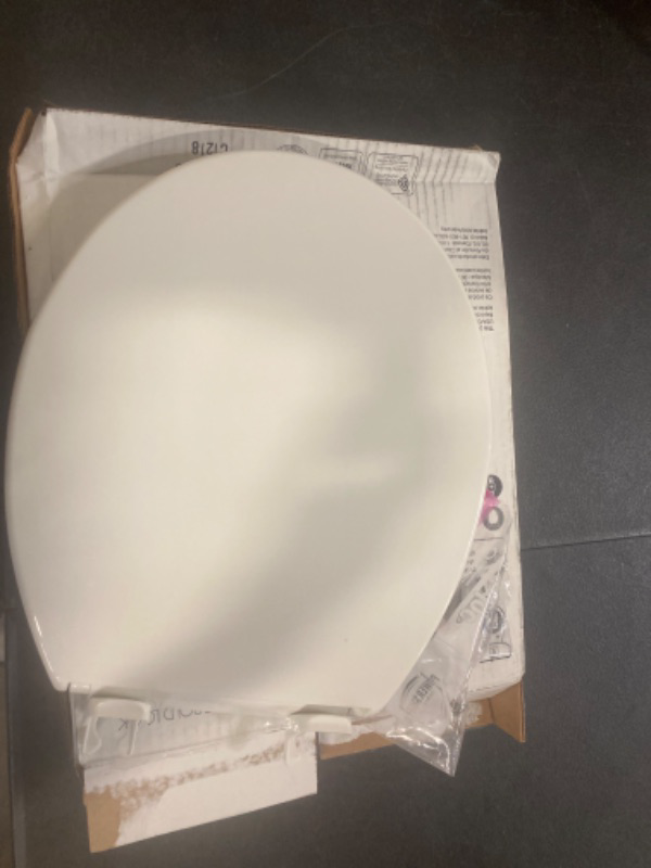 Photo 1 of KOHLER 4639-RL-0 Cachet ReadyLatch Round-Front Toilet Seat, Quiet-Close Lid and Seat, Countoured Seat, Grip-Tight Bumpers and Installation Hardware, White