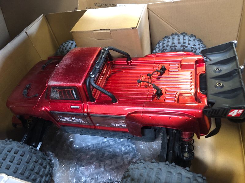 Photo 2 of ARRMA RC Truck Outcast 4X4 4S BLX 1/10TH 4WD Stunt Truck RTR (Battery and Charger Not Included), Red, ARA4410V2T4