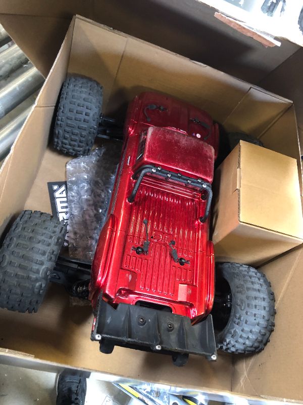 Photo 4 of ARRMA RC Truck Outcast 4X4 4S BLX 1/10TH 4WD Stunt Truck RTR (Battery and Charger Not Included), Red, ARA4410V2T4