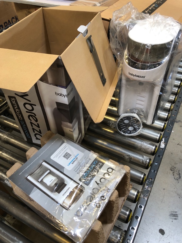 Photo 1 of Baby Brezza New and Improved Formula Pro Advanced Formula Dispenser Machine - Automatically Mix a Warm Formula Bottle Instantly - Easily Make Bottle with Automatic Powder Blending, White
