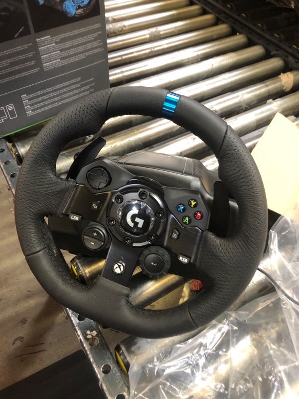 Photo 3 of Logitech G923 Racing Wheel and Pedals for Xbox X|S, Xbox One and PC featuring TRUEFORCE up to 1000 Hz Force Feedback, Responsive Pedal, Dual Clutch Launch Control, and Genuine Leather Wheel Cover Xbox|PC Wheel Only