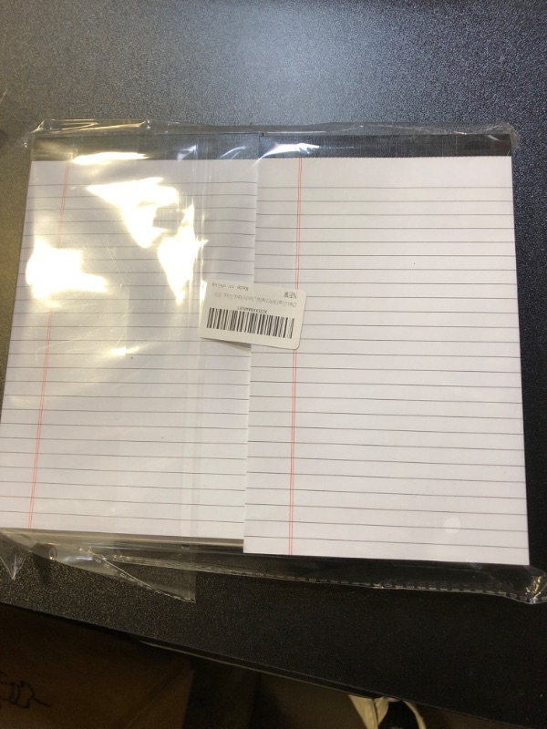 Photo 1 of `12 pack of notepad paper 