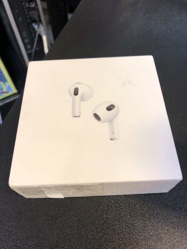 Photo 2 of Apple AirPods (3rd Generation) Wireless Ear Buds, Bluetooth Headphones, Personalized Spatial Audio, Sweat and Water Resistant, Lightning Charging Case Included, Up to 30 Hours of Battery Life
