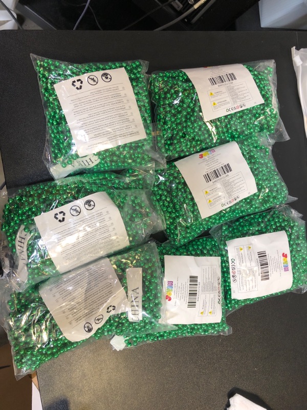 Photo 2 of  7 PACKS BUNDLE 
JOYIN 18 PCS St Patrick Green Bead Necklaces, Lucky Green Beaded Necklaces Bulk for Saint Patrick's Day Accessories, Party Costume Dressing-up Accessories, St. Patrick's Day Party Favor Supplies