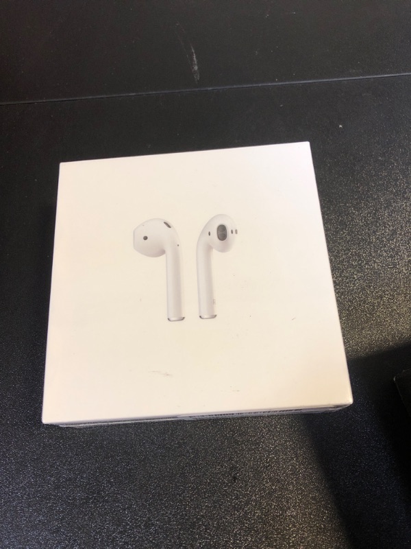 Photo 2 of Apple AirPods with Charging Case (Latest Model)