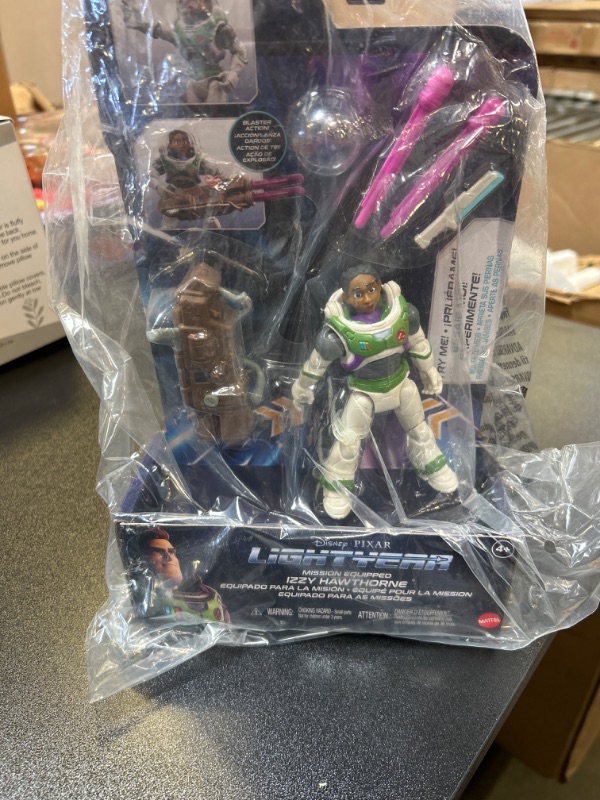 Photo 2 of Mattel Lightyear Toys Action Figure with Laser Strike Motion & Accessories, 5-in Scale Mission Equipped Izzy Hawthorne