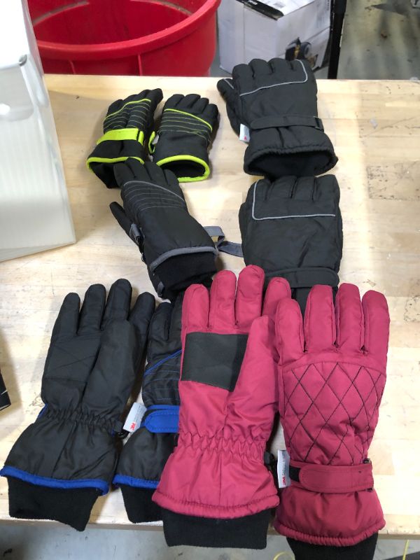 Photo 1 of BUNDLE OF USED AND NEW SNOW GLOVES 