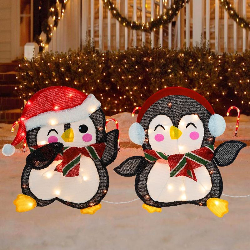 Photo 1 of Hausse Set of 2 Lighted Christmas Penguins Decorations, Pre-Lit 2D Tinsel Cute Penguin with Incandescent Lights, Light Up & Plug in for Indoor Outdoor Xmas Winter Holiday Yard Lawn Garden Decor