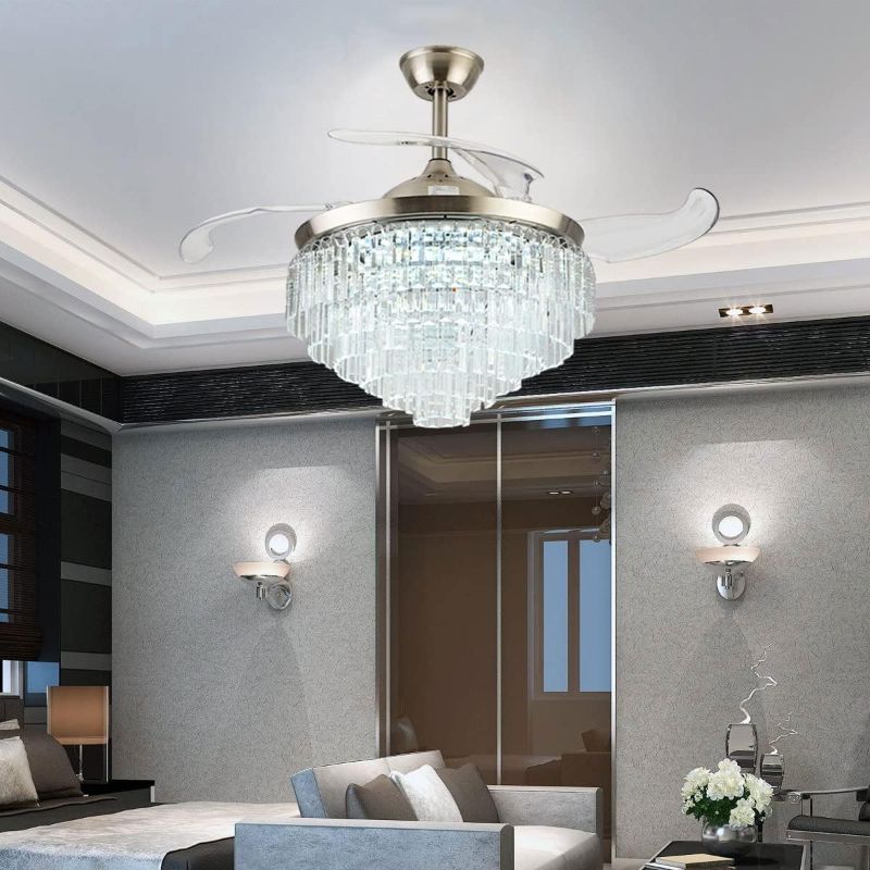 Photo 1 of A Million Crystal Ceiling Fan with Light, 42inch Crystal Chandelier with Retractable Blades and Remote, 3 Speeds 3 Color Change Silent Motor Lighting Fixture (Sliver) Silver