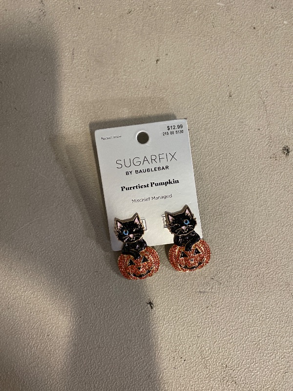 Photo 1 of pumpkin cat earing 
