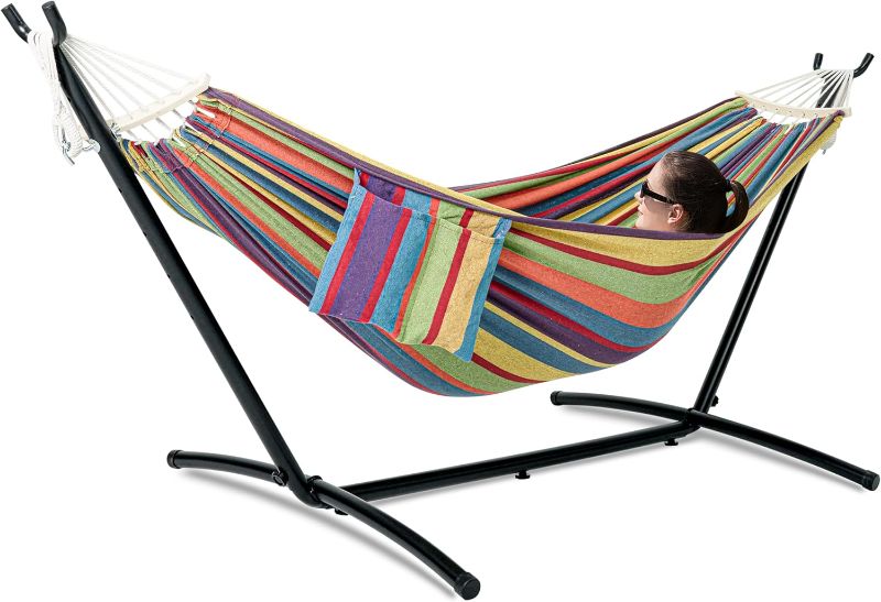Photo 1 of Double Hammock with Stand for Outside, Upgraded Spreader Bar, Heavy Duty Space Saving Steel Stand 2 Person, Side Pockets, Easy Assembly, 600lbs Weight Capacity, Indoor & Outdoor 