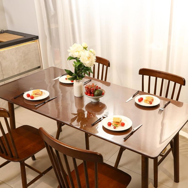 Photo 1 of ETECHMART Clear Plastic Table Cover Protector Rectangle 36 x 60'', Thick Waterproof Transparent Table Protector for Dining Table, Non-Slip Heat Resistant Clear Desk Mat for Kitchen Office Desktop