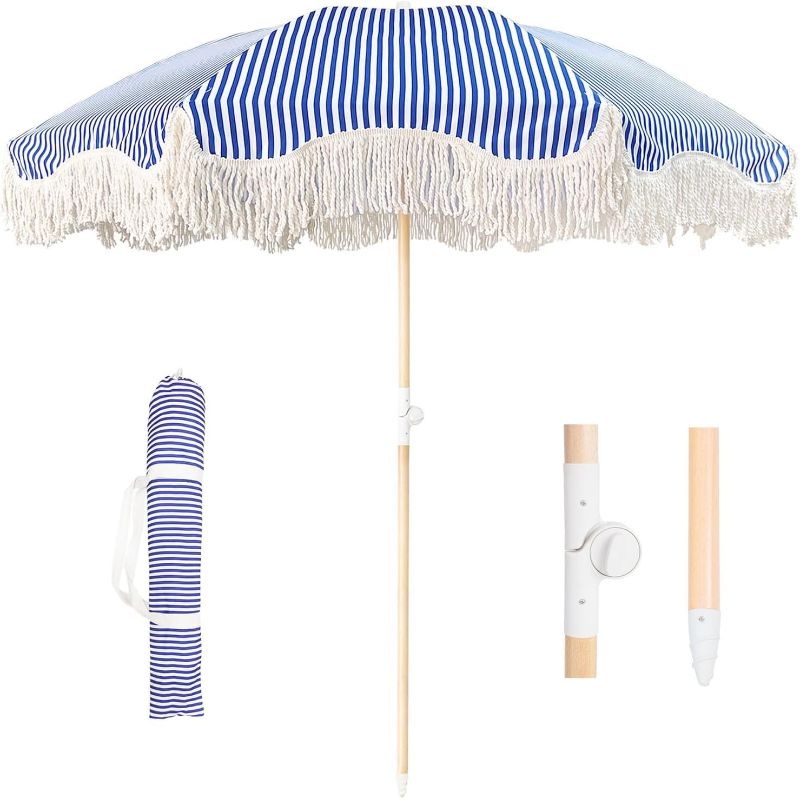 Photo 1 of Fringe Umbrella Outdoor with Carry Bag, Striped Patio Umbrella Wooden Pole Beach Umbrella with Tassels Boho Tilt Adjustment Outdoor Table Umbrella UV Protection Deck Umbrella Waterproof