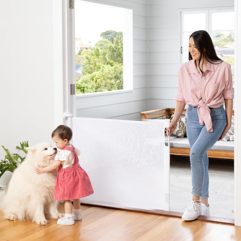 Photo 1 of Retractable Baby Gate Perma Child Safety 33" Tall x 71” Wide, Mesh, for Stairs, Doorways, Dogs, Pets, Indoor, Outdoor, One-Handed Operation, Locking, Easy Install, Hardware Mount, White