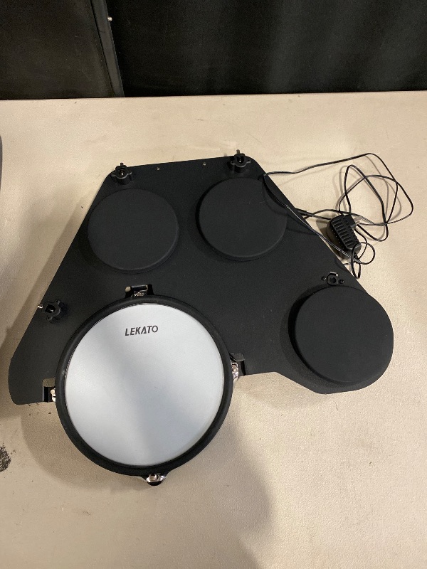 Photo 1 of LEKATO Electronic Drum Set, Portable Electric Drum Set for Beginner with Quiet Mesh Snare Drum Pads, 220+ Sounds, USB MIDI, 2 Switch Pedal, Electric Drum Kit with Travel Bag.