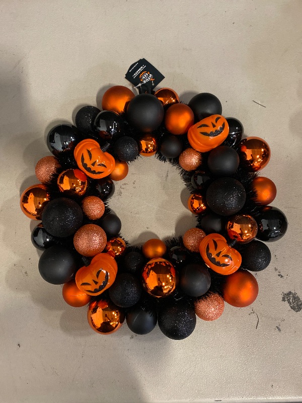 Photo 1 of Halloween decor shatterproof pumpkin wreath .