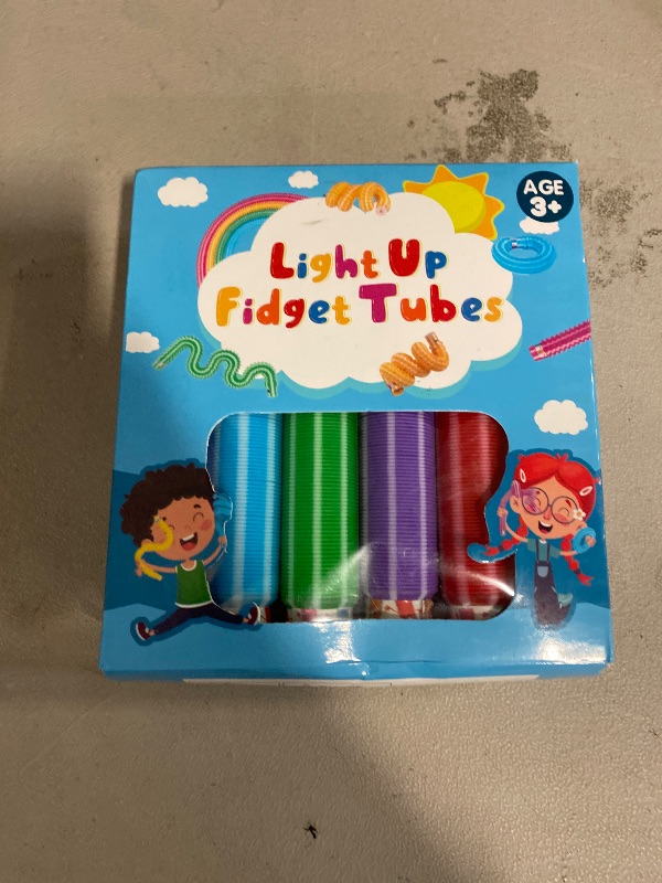 Photo 1 of Pop Tubes, 12 Pack Mini 5" Sensory Fidget Tubes, Stretch Up to 18" Long, Stress Reliever Pipe Toy, Popular Plastic Fidget Tubes for Boys and Girls, Ages 3+