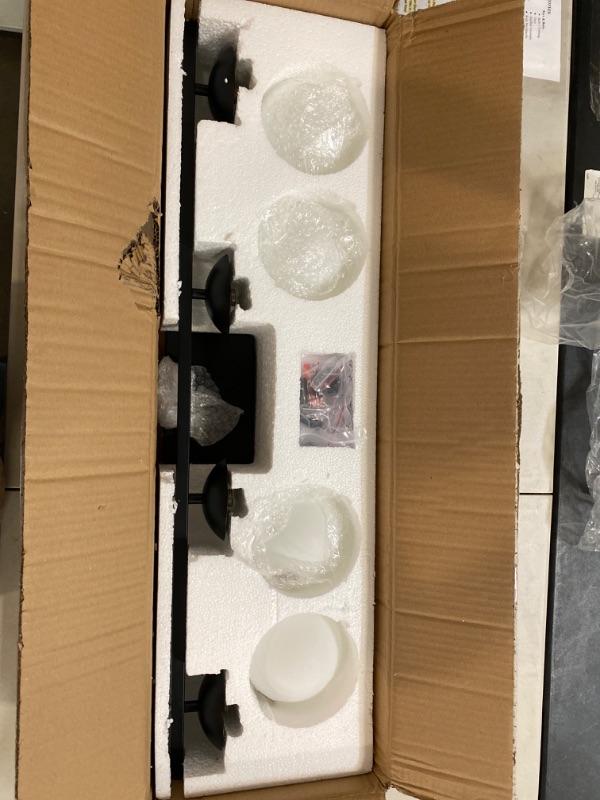Photo 1 of Generation Lighting 4461604-112 Clybourn Vanity, 4-Light 240 Total Watts, Midnight Black
