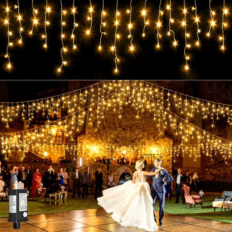 Photo 1 of 400 LED Icicle Christmas Lights Outdoor -33ft Icicle Lights 8 Modes Fairy Curtain Light with 75 Drops, Waterproof Plug in Hanging String Lights for Indoor Party Holiday Wedding Decoration, Warm White
